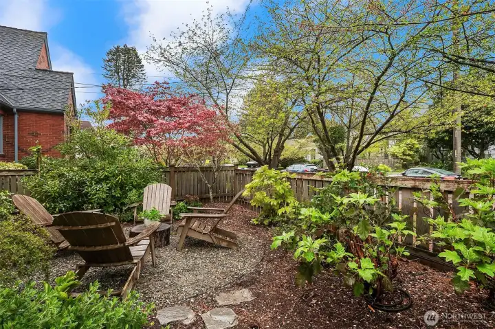 Beautiful front yard set on a tree-lined street.