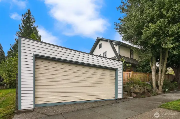 Large detached garage with electricity and new roof.