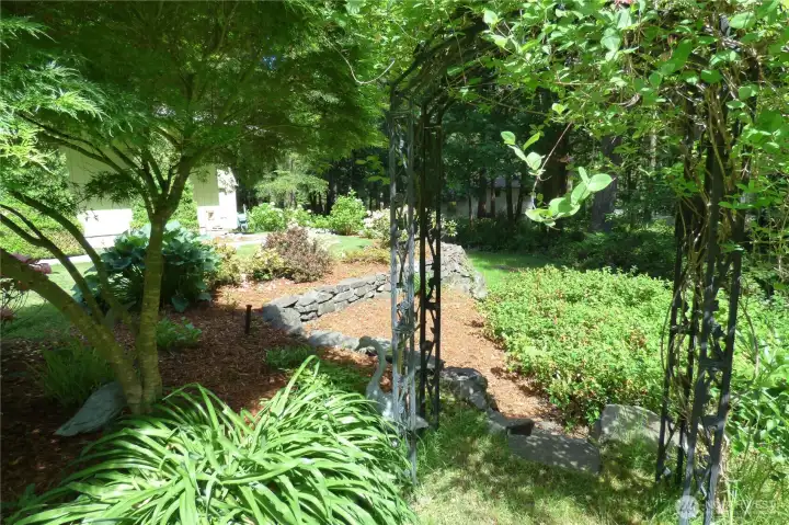 Beautiful landscaping throughout the yard.