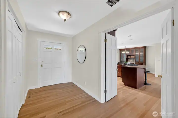 As you enter you have the living room straight ahead and the kitchen and family to the left and a hall leading to the bedrooms on the right.