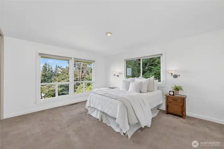 Primary bedroom on the west side of the home