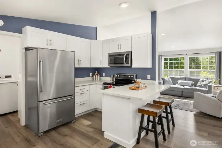 Kitchen with access to the laundry room