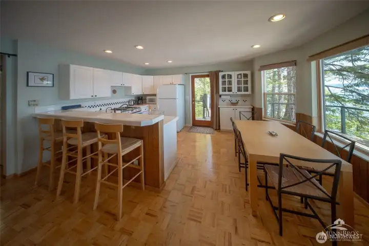 Kitchen with eating area. Kitchen with eating area.