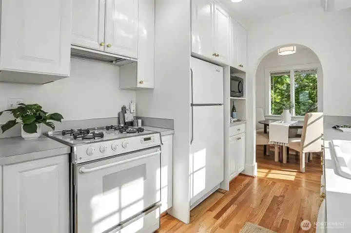 Kitchen with gas range and oven. Kitchen with gas range and oven.