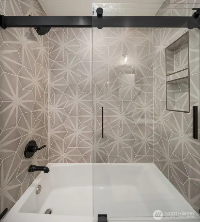 Beautiful tile and fixtures in main floor bath