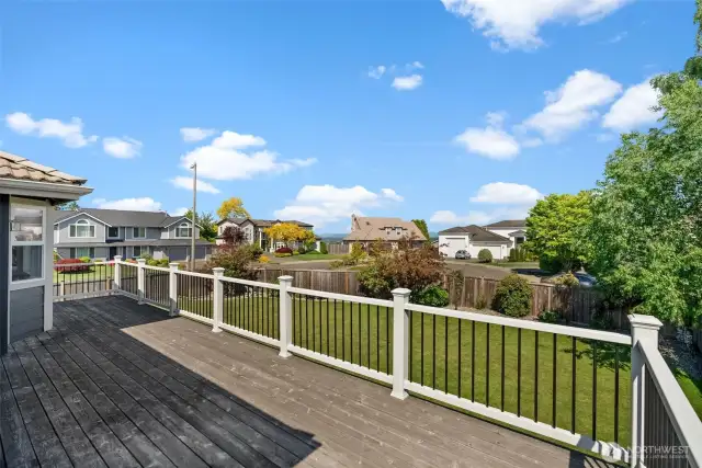 Huge deck off kitchen with views of the mountains and water