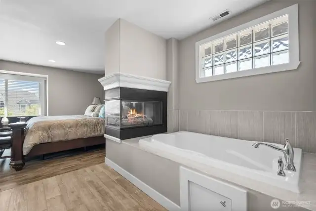 Primary with fireplace, tub and walk-in shower