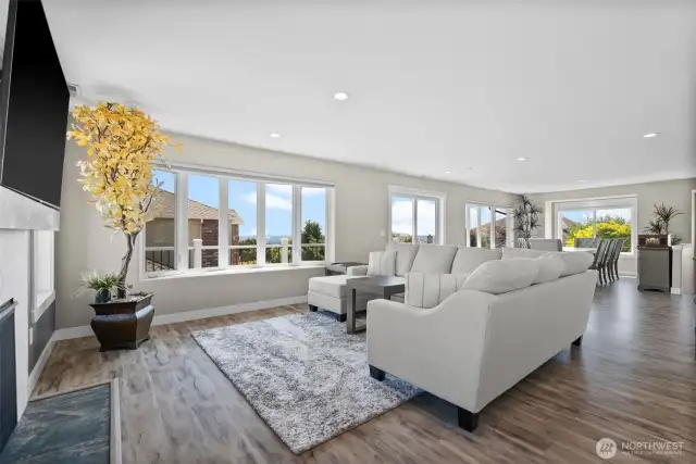 Bright and open main floor with SO many windows to let the light in and enjoy the views