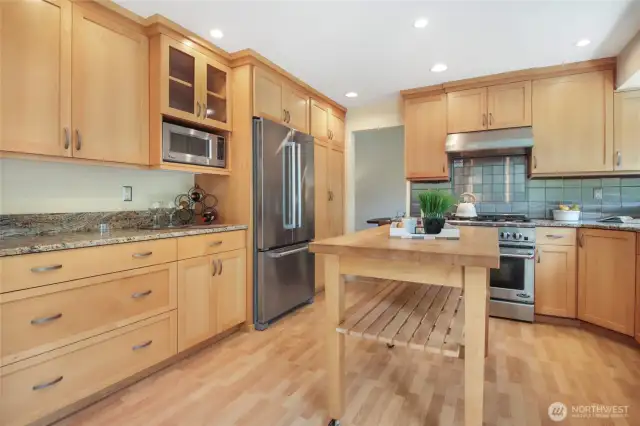Pantry with pull-out shelving adds to the storage.