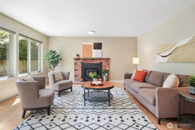 The spacious family room adjoins the kitchen and nook areas.