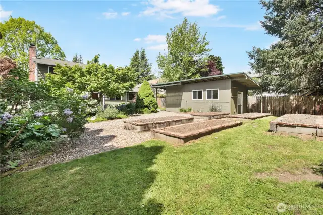 The large yard offers spaces to relax, entertain, garden or just listen to the birds.