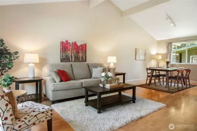 A vaulted ceiling adds a spacious feeling to the living room and dining room.