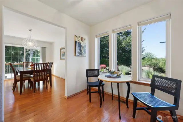 From the dining room is a breakfast area. To the right is the laundry room and garage entrance.