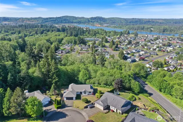 Aerial view of home on culdesac overlooking the Chehalis river, Cosmopolis and Aberdeen.