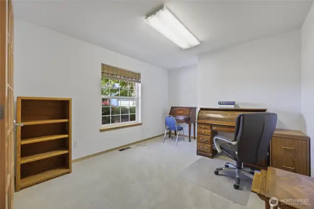 Bedroom #1 currently being used as an office.