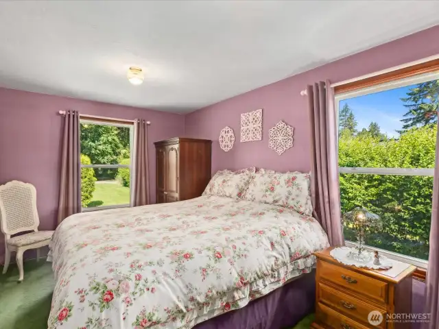 Primary bedroom with lots of natural light