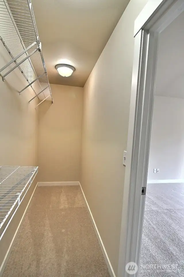 This is one of 2 walk-in closets in the primary suite!