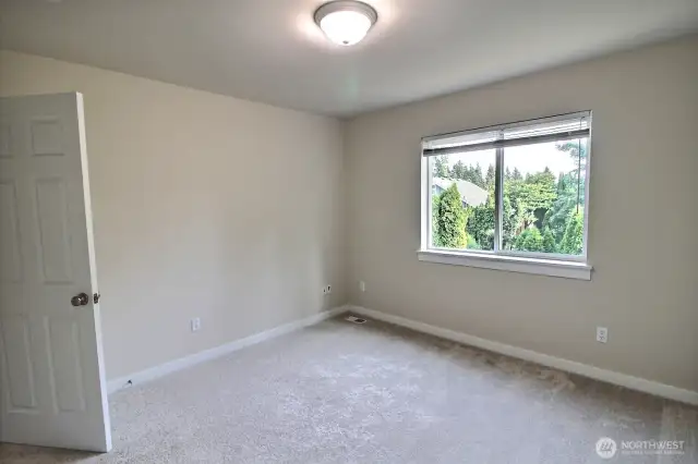 The roomy 3rd bedroom is located at the back of the house.