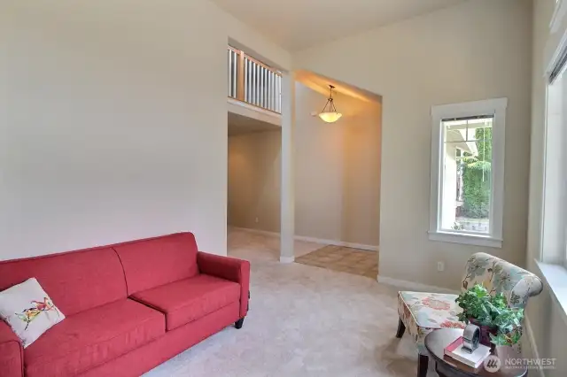 Looking from the living room back to the entry - fresh interior paint and new carpeting makes this home move in ready!