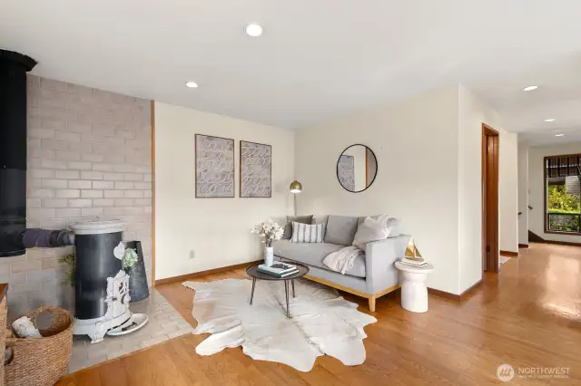 Open kitchen w/ Sound views, casual dining area & den