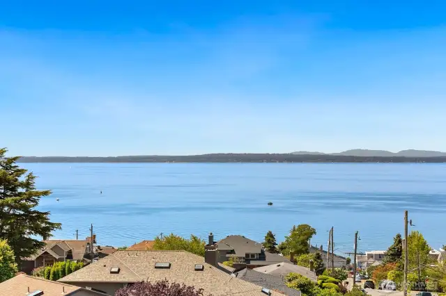 STUNNING, PANORAMIC VIEWS of Puget Sound & Olympic Mtns are the focal point of this 4 bed/4 bath Richmond Beach home.