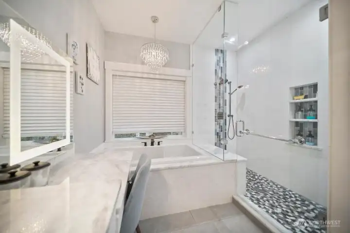Exquisite tiled shower with shower stations at each end!