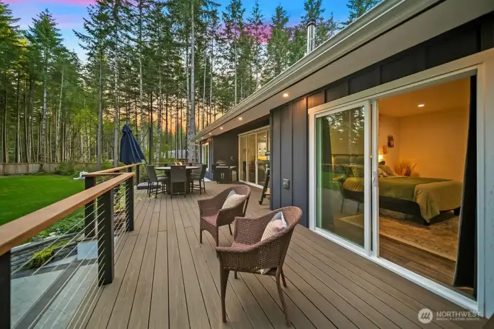 The treed perimeter but open interior allows for sunshine and sunsets.  The exterior lighting in the  T & G pine soffits provides enjoyment long into the evening and security.