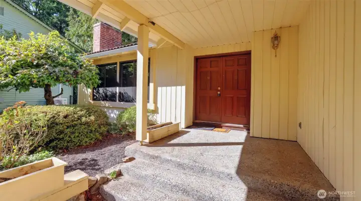 Inviting covered entry welcomes you home with charm and character.