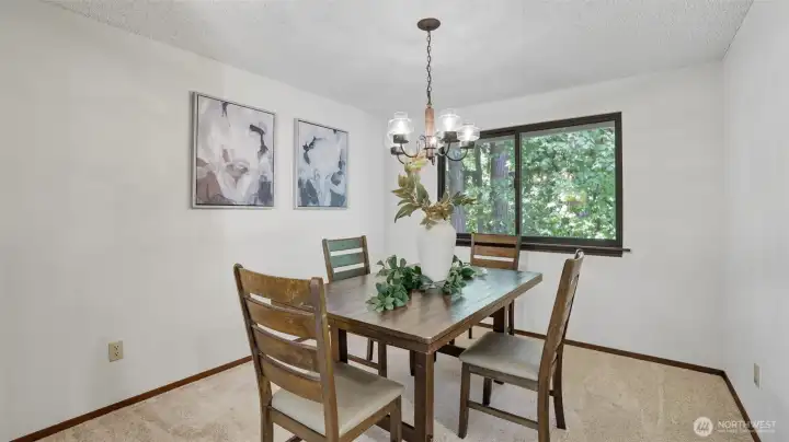 This formal dining area is perfect for gatherings and everyday meals.