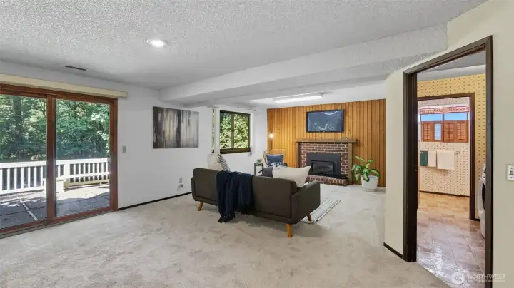 Flexible living space on the lower level is ideal for entertaining, relaxation, or play.