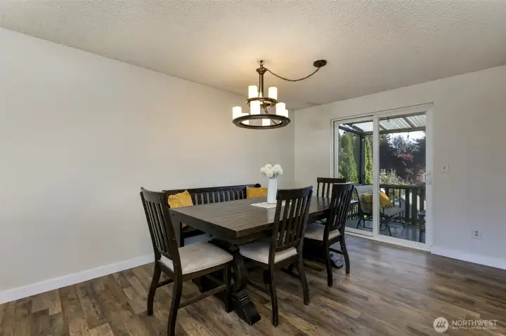 Plenty of room to host dinner parties, access to an updated back deck with territorial views.