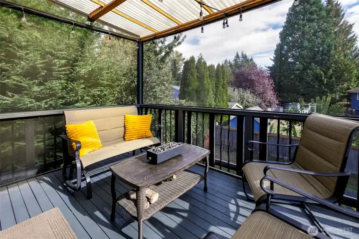 Sizable, covered backyard deck. Great place to sip your morning coffee or an afternoon refresher.