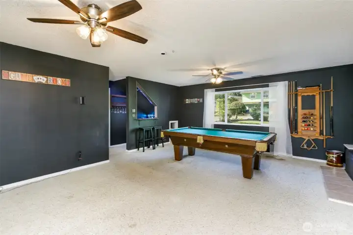 Who's ready to host a gathering?!?!? Great space with wet bar and fridge, both living and family room TVs stay with the house, pool table stays too! Cozy gas fireplace! $5,000 buyer credit for carpet or exterior paint allowance.