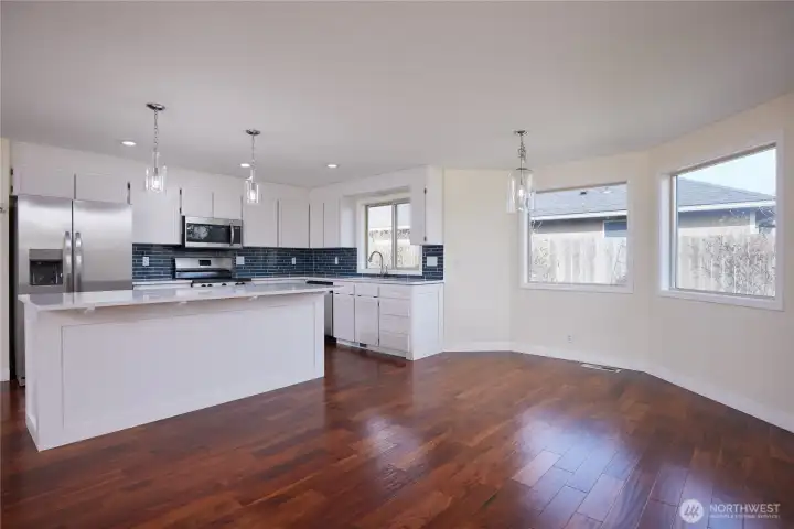 Kitchen and eating area unstaged