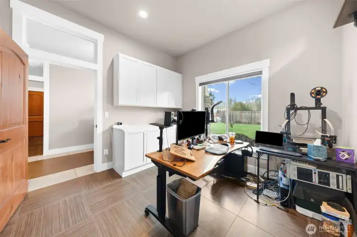 Dedicated downstairs office space with room for work, study, or creative use.