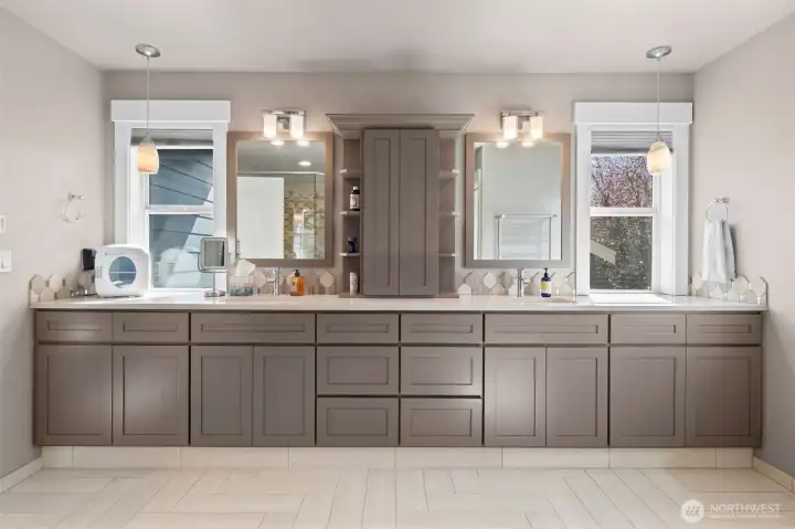 Spacious primary bath with dual vanity and extensive counter space.