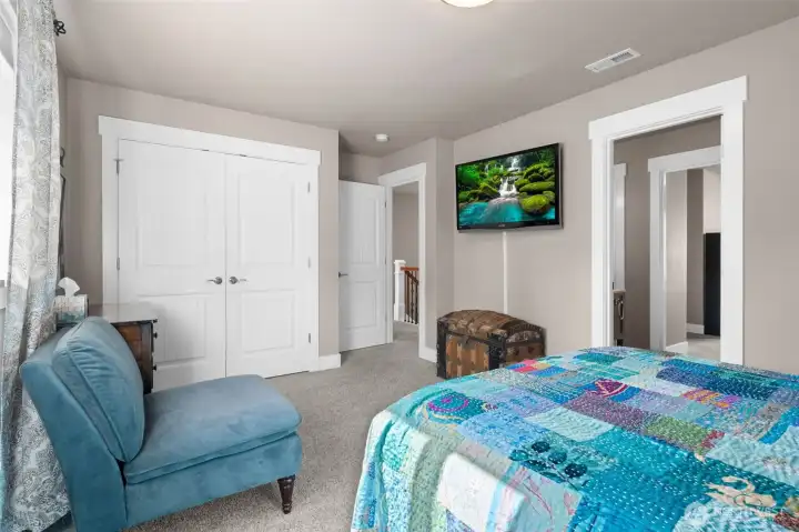 Additional bedroom with natural light and comfortable proportions. Adjacent to Jack and Jill bathroom