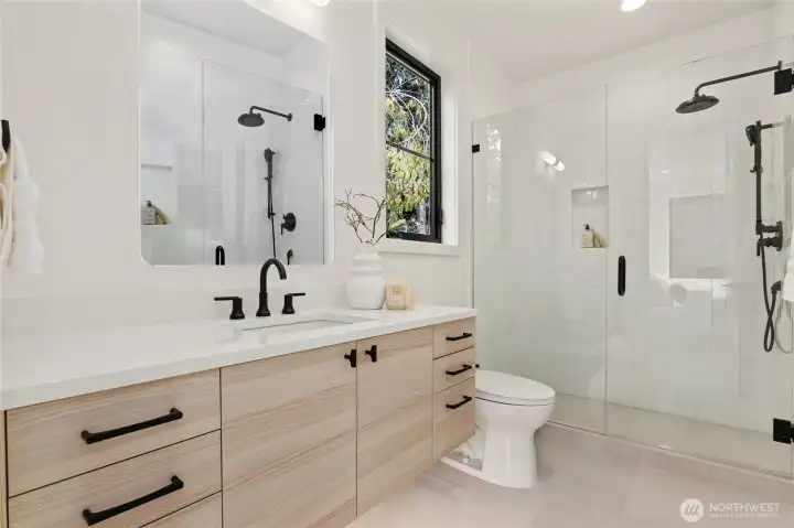 Primary Suite Bath with Floating Cabinet, Sensor Lighting and Luxury Seamless Glass Shower with Hand Held and Built-In Shelf