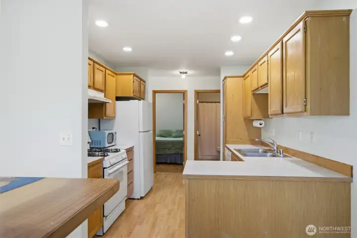 From dining area through kitchen