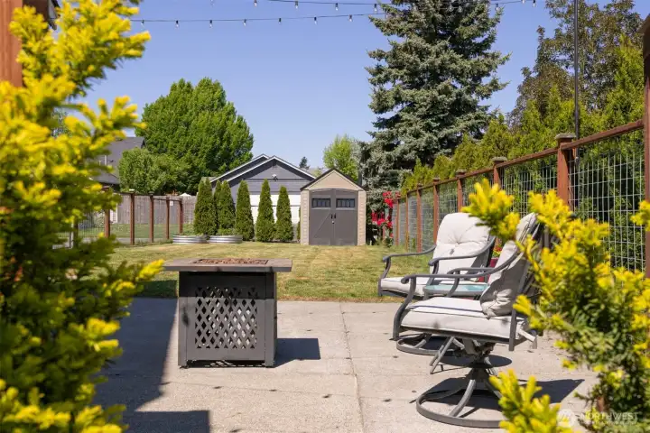 From front gate through patio to yard and shed