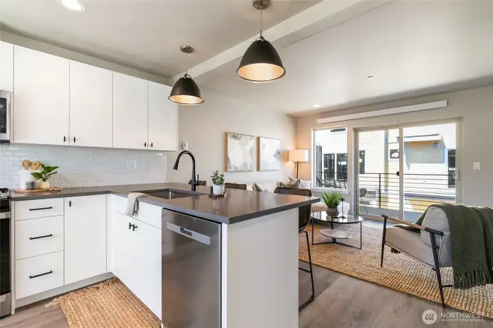 Staged photo of like unit. All cabinets are manufactured locally.
