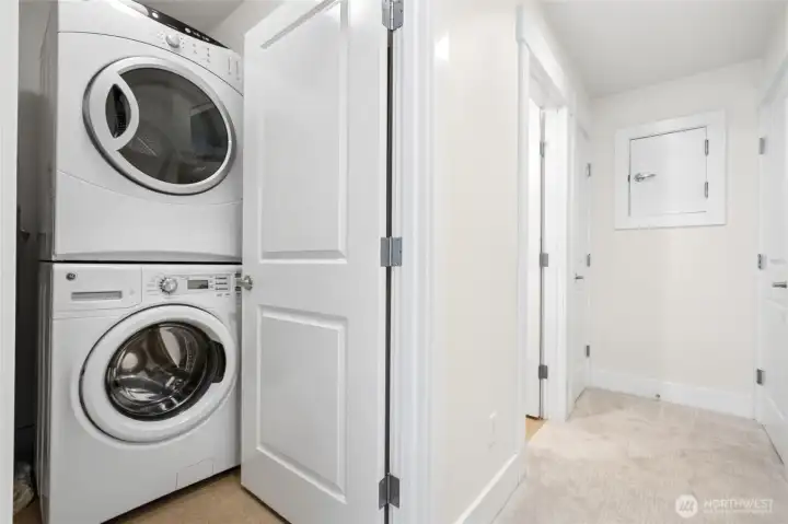 Laundry and storage area, lower level.