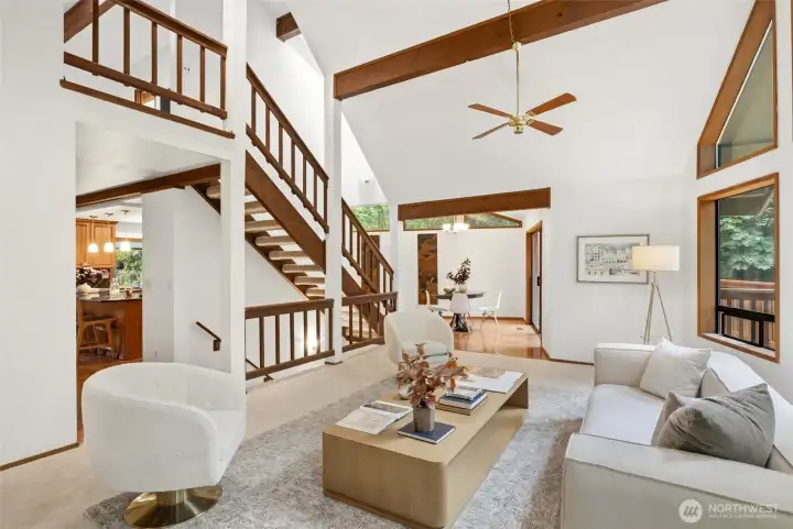 Primary Bedroom and Stairs Open to Living Room