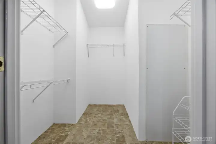 Primary walk-in closet Primary walk-in closet