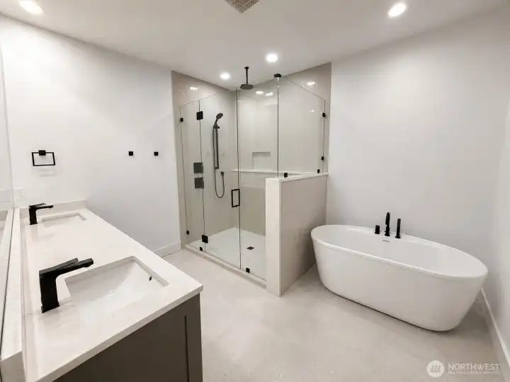 Primary Bath with soaker tub, full tile shower and double vanity