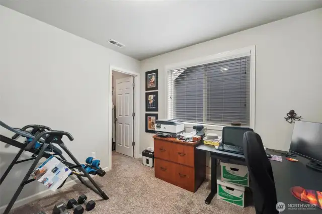One of the bedrooms currently being used as an office