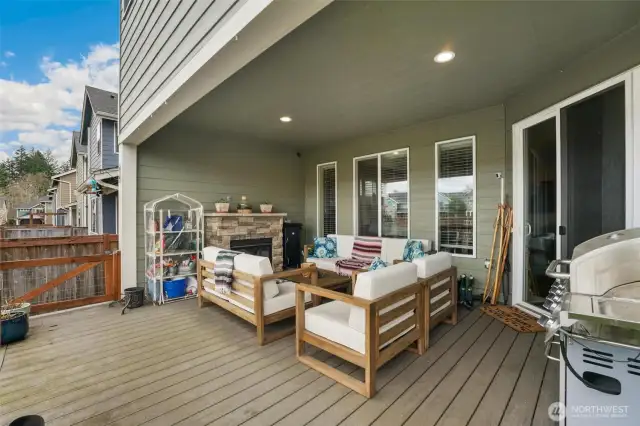 Covered back porch with fireplace