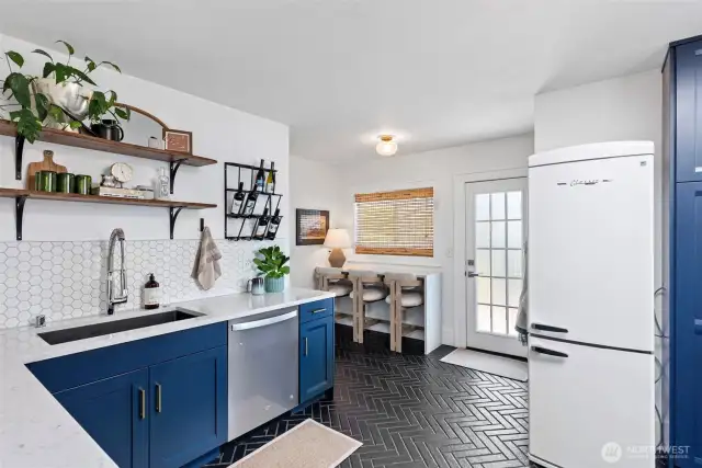 Completely new kitchen with eating space. Notice the gorgeous floor!