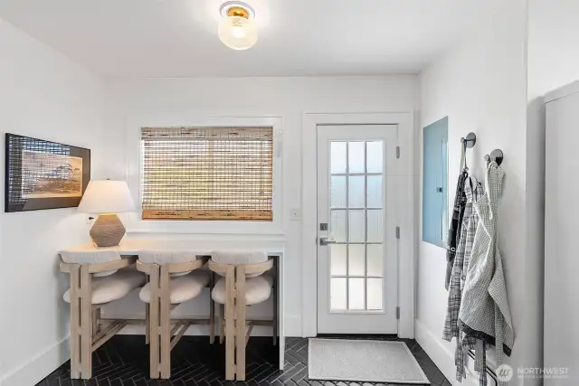 Eating , or work space. Beautiful door leads out to the deck.