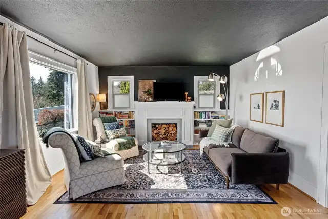 Living room boasts original built in bookcases and a spectacular view!